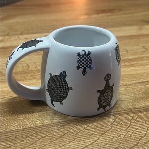 Charming White Mug with Black Turtle Design. #208